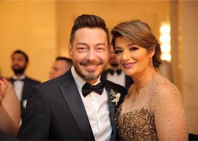 أحمد زاهر وزوجته هدى