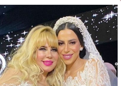 منى إش إش وابنتها