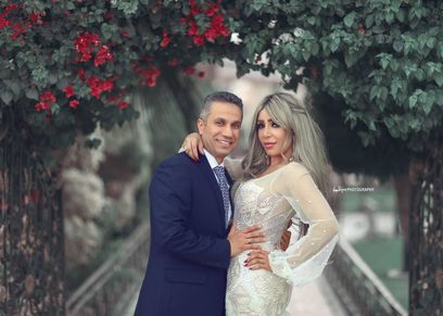 العميد محمد سمير وزوجته إيمان أبوطالب
