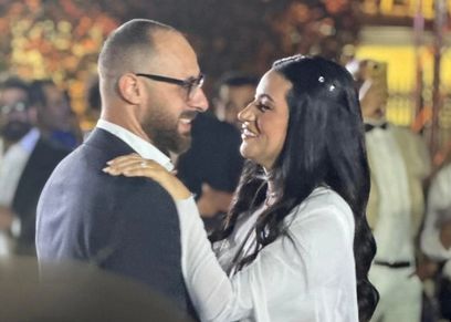 المخرجة بتول عرفة وزوجها