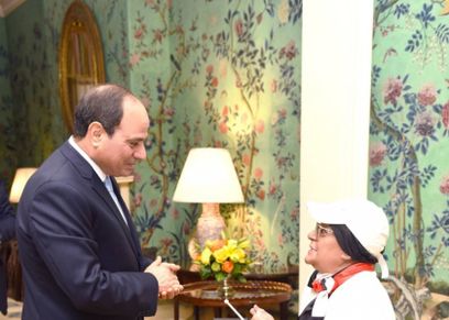 السيسي يلتقي بسيدة في نيويورك
