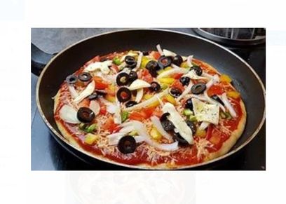 بيتزا الطاسة- أرشيفية