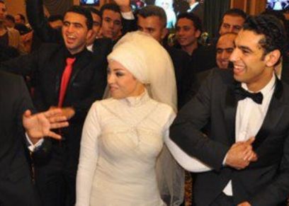 محمد صلاح وماجي