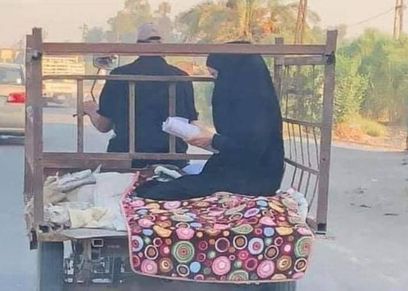 الطالبة العراقية سارة حسين ووالدها