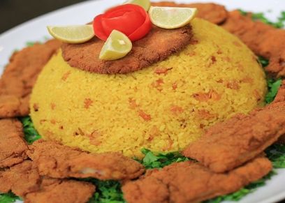 سمك بانيه بالأرز والزبيب