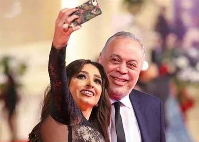 أشرف زكي وروجينا
