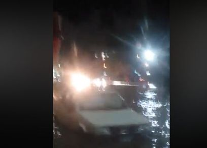 سيدة تجد جثة غارقة في الشارع بسبب مياه الأمطار