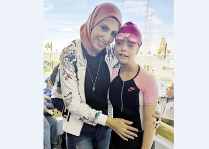 ملك مع والدتها