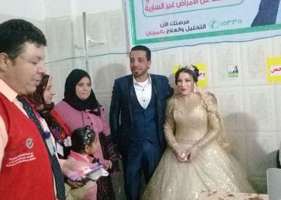 عروسان داخل مقر حملة فيروس سي