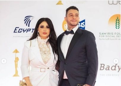 الفنان أحمد الفيشاوي وزوجته