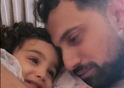 الطفلة  الفلسطينية وابيها