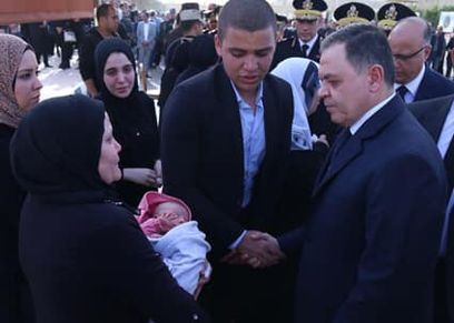 زوجة شهيد النزهة وأبنته