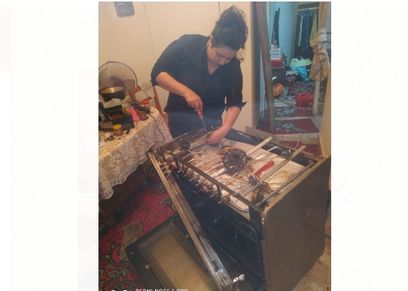 امنية تعمل في مهنة صيانة البوتاجازات