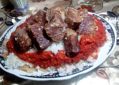طريقة عمل الفتة بالخل والثوم