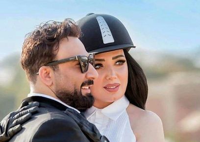عبير صبري تقبل زوجها بمناسبة عيد ميلاده..