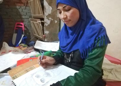 إيمان أثناء الرسم