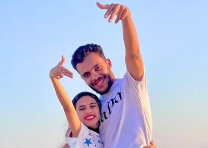 تغريد صلاح العريني وأخيها محمد