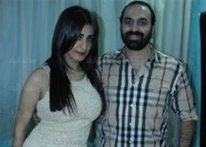 اللاعب جمال حمزة وزوجته