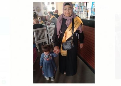 نجلاء سيد أم ل5 أطفال اصغرهم طفلة متلازمة داون