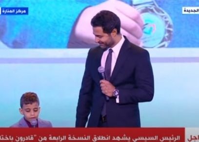 الطفل محمد محمود مع الفنان كريم فهمي