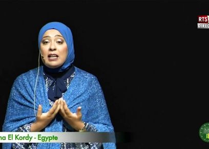دينا خلال تقديمها لرسالتها