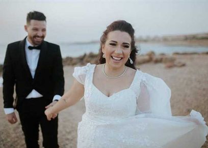 أسما شريف منير وزوجها