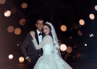 عصام صاصا وزوجته
