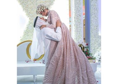 مشاعل الشحي وزوجها أحمد خميس