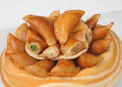 طريقة عمل القطايف بالقشطة والمكسرات