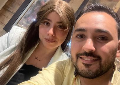 أمل فرح وزوجها