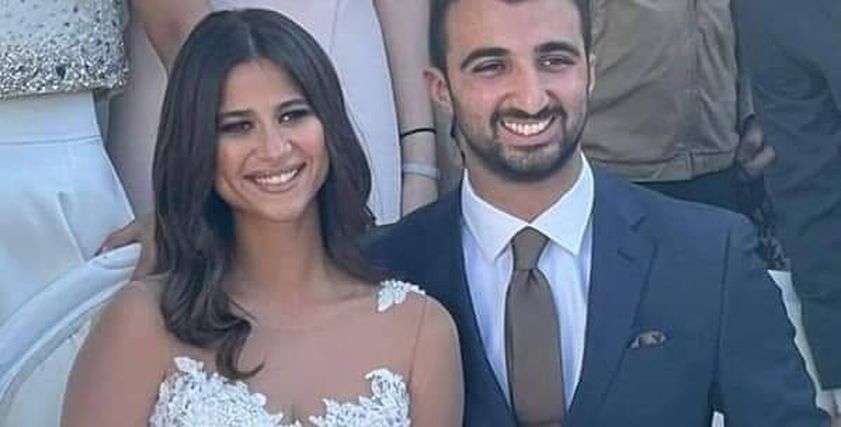 دينا داش وزوجها