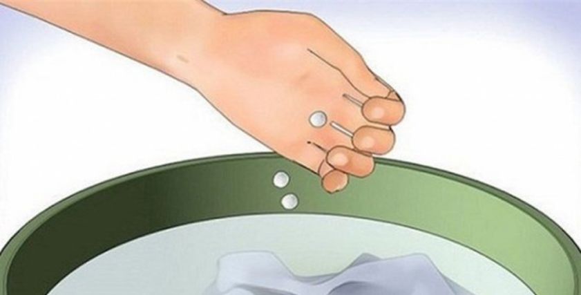 وضع الأسبرين على الملابس