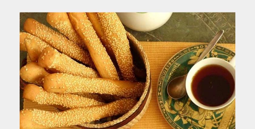 تناول البقسماط صباحا- تعبيرية