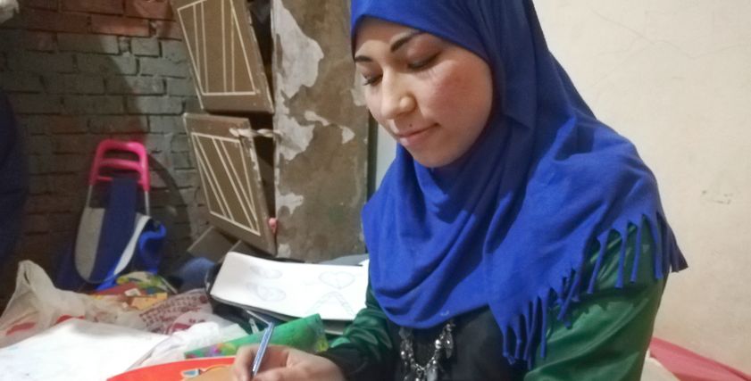 إيمان أثناء الرسم