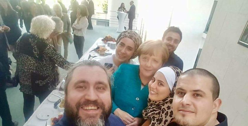 ملكة السورية مع المستشارة الألمانية ميركل
